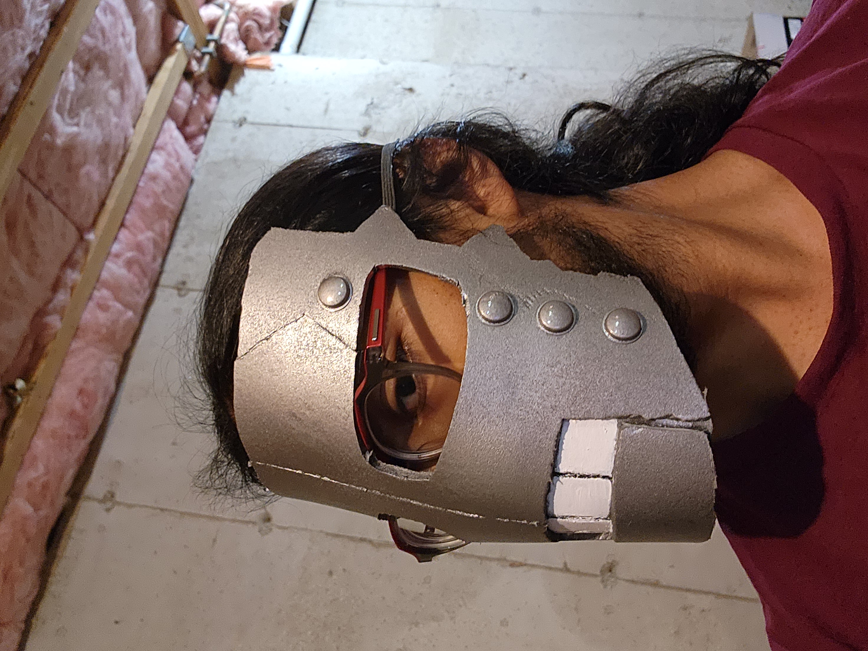 Painting the teeth white and wearing the mask