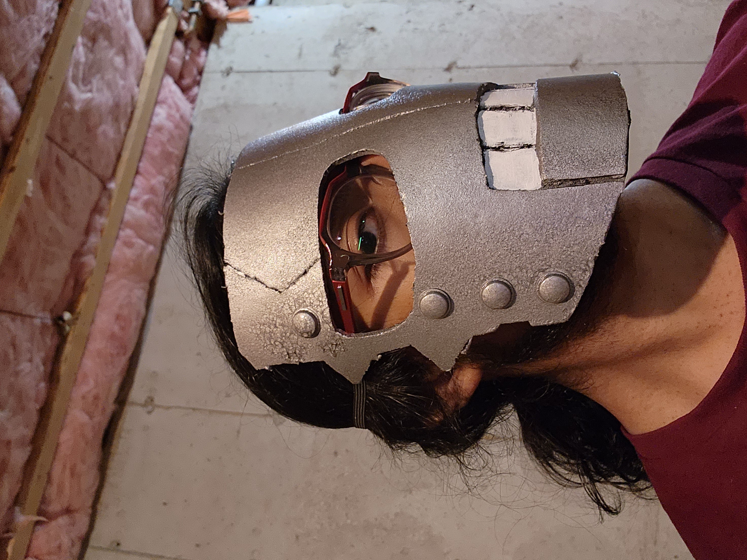 Painting the teeth white and wearing the mask